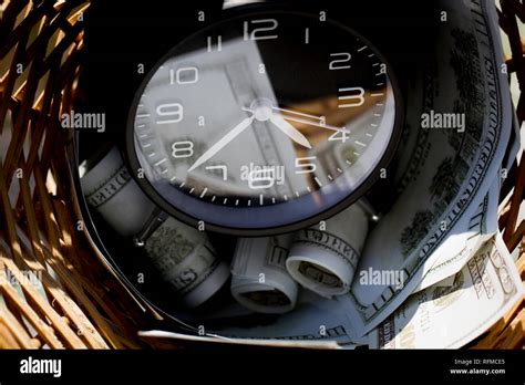 Clock And Money Precious Time Stock Photo Alamy