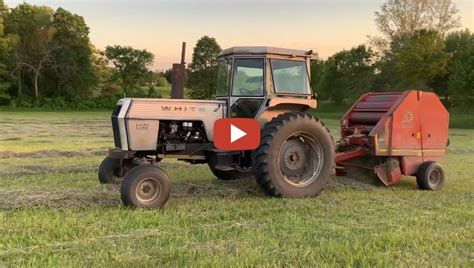 White And Baling And Hauling First Crop Hay Making