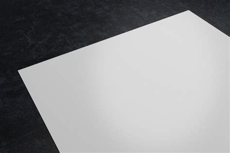 Premium Photo White Paper On Dark Desktop