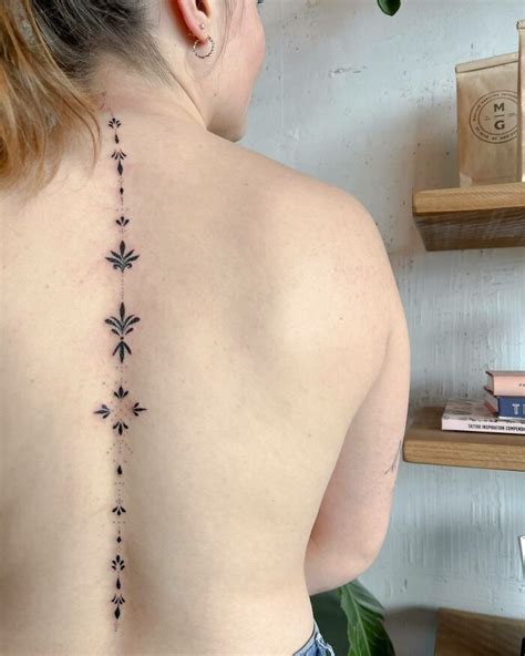 Beautiful Spine Tattoos That Make The Pain Worth It Spine Tattoos