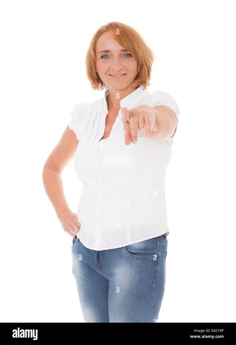 Mature Woman Pointing With Finger All On White Background Stock Photo
