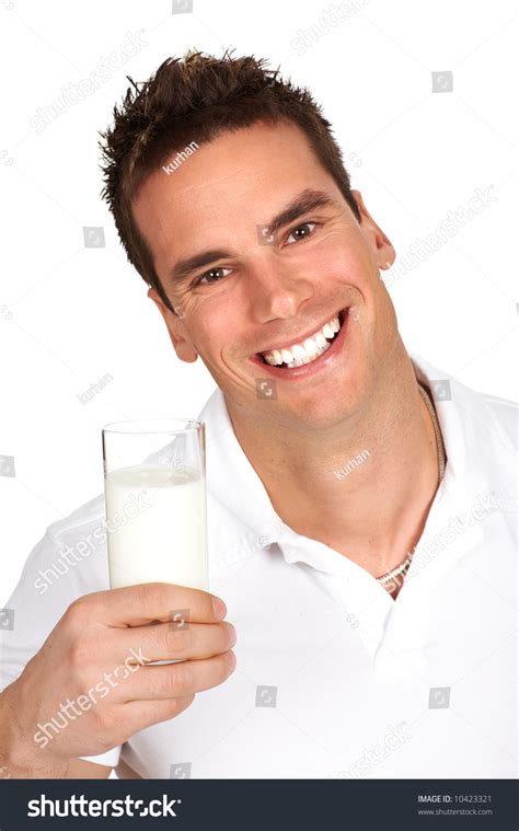 Young Happy Man Drinking Milk Over White Background Stock Photo