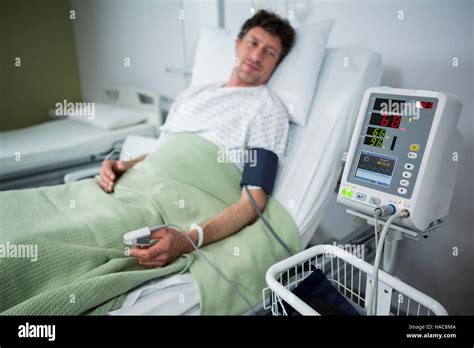 Patient Looking His Pulse Rate In Machine Stock Photo Alamy