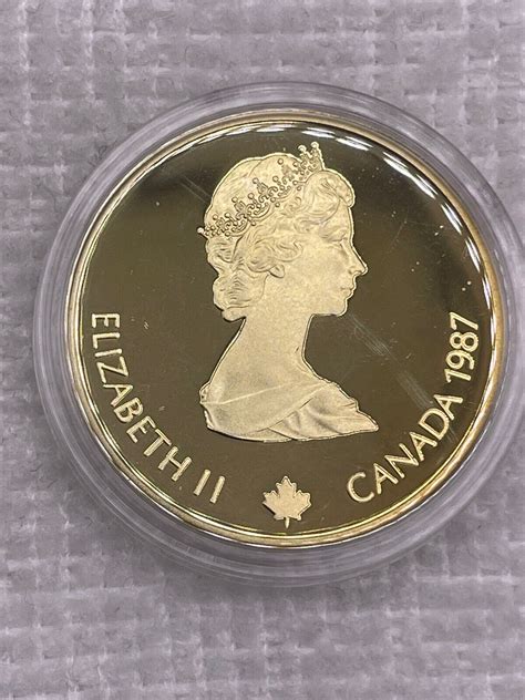 1987 Royal Canadian Mint Canada Gold Proof 100 Calgary Olympic Torch