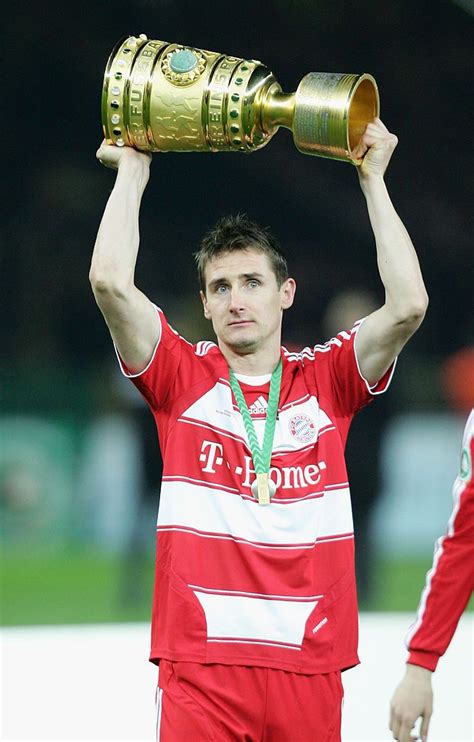 BERLIN APRIL 19 Miroslav Klose Of Munich Celebrates With The Trophy