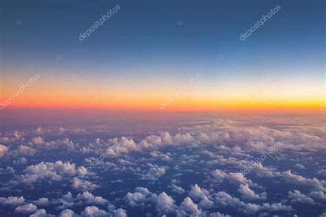 Flying above the clouds. view from the airplane, soft focus Stock Photo by ©valio84sl 112350332