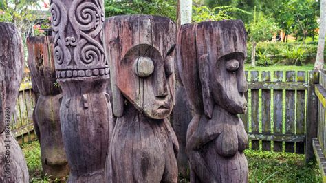 Configuration of traditional dayaknese (Indigenous tribe of Borneo / Kalimantan) wood sculptures ...