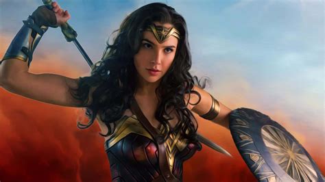 Download Wonder Woman Standing Strong In A Battlefield