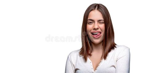 Shows Tongue And Winks Portrait Of Funny Girl With Showing Tongue