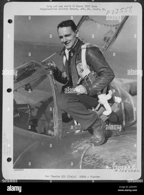 A Pilot Of The 94Th Fighter Squadron 1St Fighter Group Climbs Into