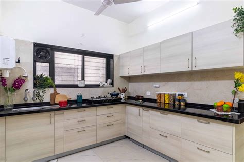 Classic Modular L Shaped Kitchen Design With Wooden Cabinets | Livspace