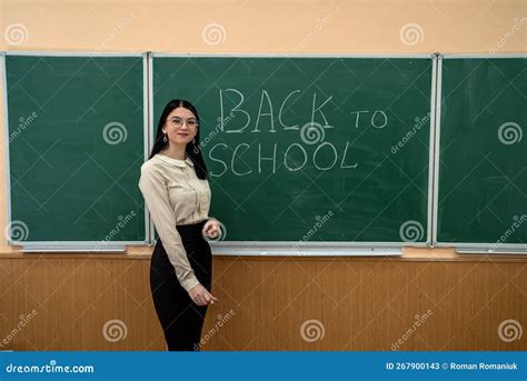 Young Pretty Teacher Standing Near Classboard Stock Image Image Of