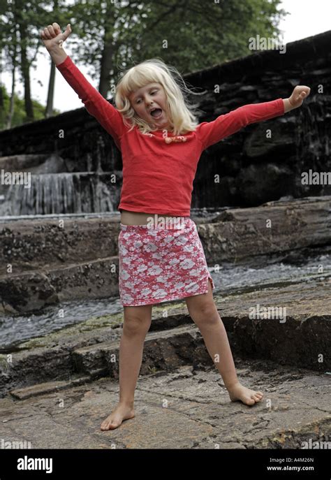 Dancing Blonde Girl Stock Photo Alamy