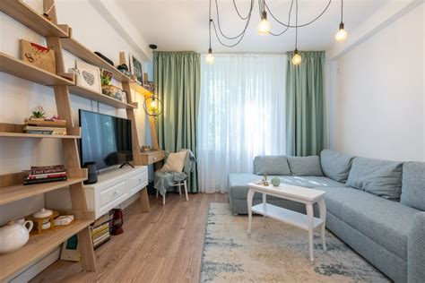 Amenajare apartament cu două camere dormitor transformat în living