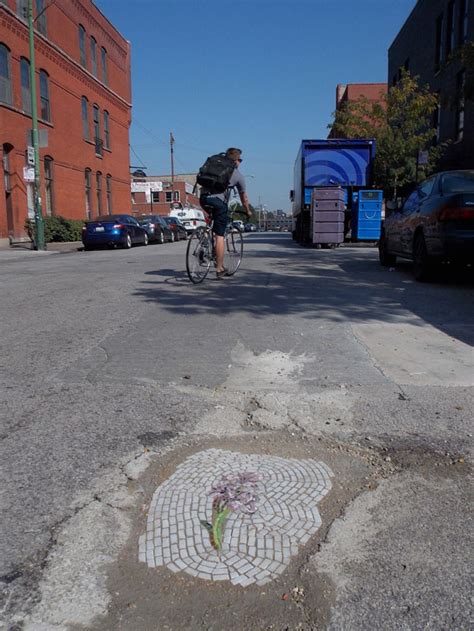 The Exquisite Irony of Chicago's Pothole Art | 22 Words