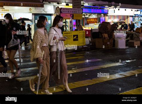 Hong Kong China 2 Apr 2022 Two Masked Young Ladies Cross Sai Yeung