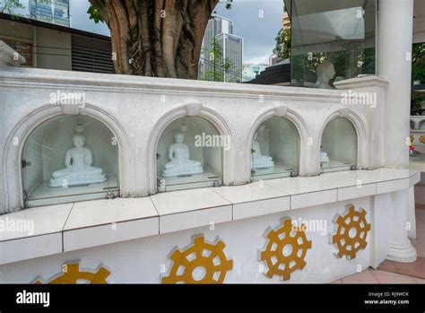 Small Buddha Statues In The Courtyard Of Buddhist Maha Vihara Temple In