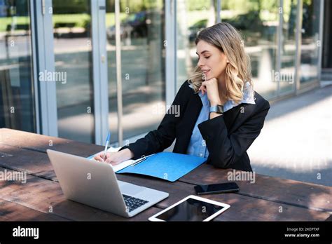 Successful Businesswoman Working Outdoors Corporate Woman Sitting On