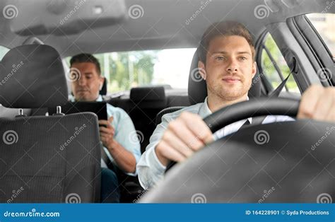 Male Taxi Driver Driving Car With Passenger Stock Image Image Of