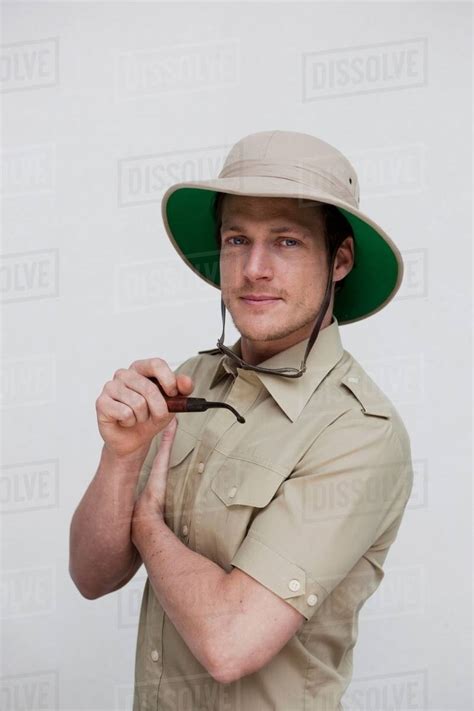 Man In Jungle Outfit Looking At Viewer Stock Photo Dissolve
