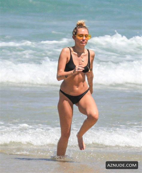 Miley Cyrus Wears A Black Bikini At The Beach In Byron Bay Australia Aznude