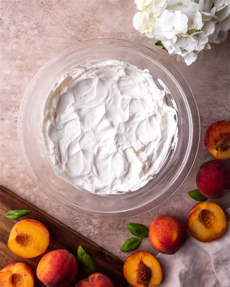 Peaches And Cream Layer Cake In Bloom Bakery