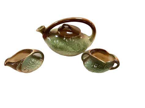 Lot McCoy Pottery Green And Brown Tea Set