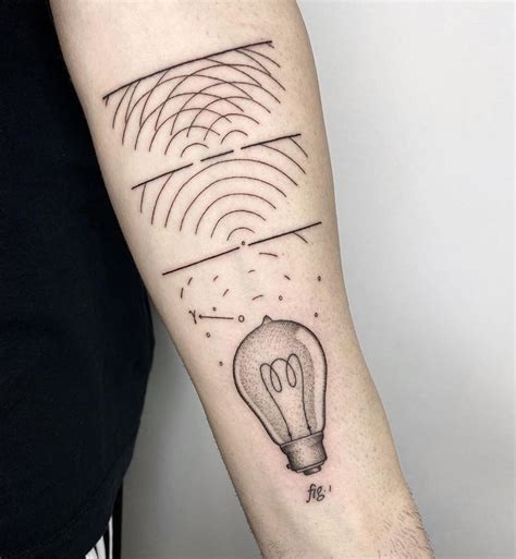 A Person With A Tattoo On Their Arm Has A Lightbulb In The Shape Of A Wave