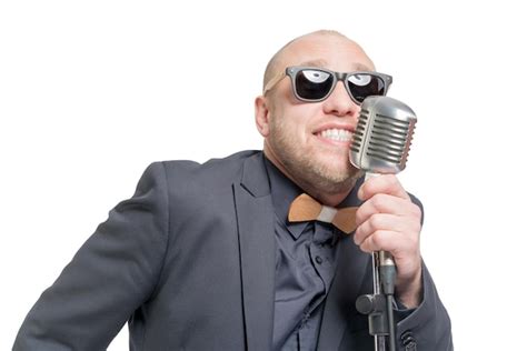 Premium Photo Unshaven Bald Man In A Gray Suit And Sunglasses Holding