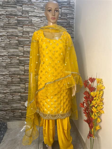 Yellow Banarse Brocade Salwar Suit With Net Ruffle Dupatta Mehendi