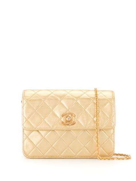 Shop Gold Chanel Pre Owned Quilted Cc Shoulder Bag With Express