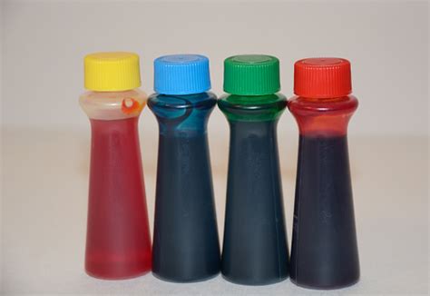 Food Coloring In Plastic Bottles Stock Photo - Download Image Now - Food Coloring, Green Color ...