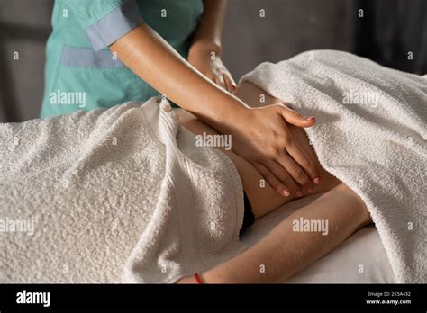 Hands Massaging Female Abdomen Macro Close Up Of Therapist Applying Pressure On Belly Thai