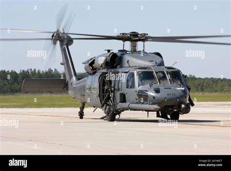 A HH 60G Pave Hawk Helicopter Equipped With GAU 18 A 50 Caliber