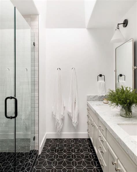 Blomma Honed Marble Mosaic Tile In Nero Honed Marble Guest Bathroom