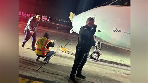 American Airlines Regional Plane Collides With Shuttle Bus Injures Two