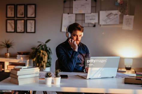 Pensive Businessman Attending Online Business Meeting High Res Stock