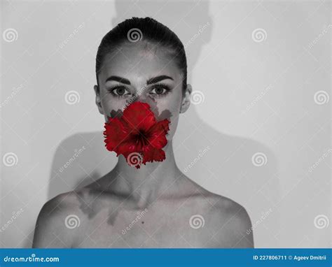 Pretty Woman With Red Flower In Her Mouth Naked Shoulders Cosmetics