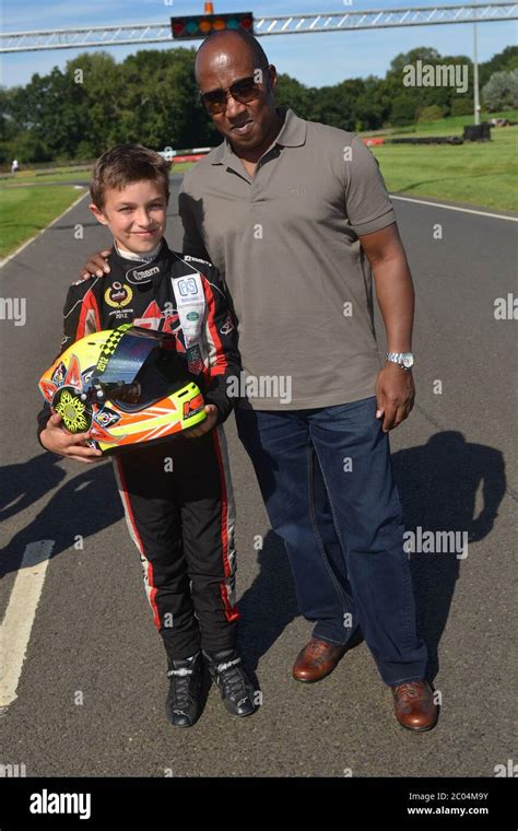 Lando Norris with Lewis Hamilton's father Anthony in 2012 Stock Photo ...