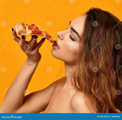 Young Beautiful Woman Eat Pepperoni Pizza Slice And Hold Whole Pizza In