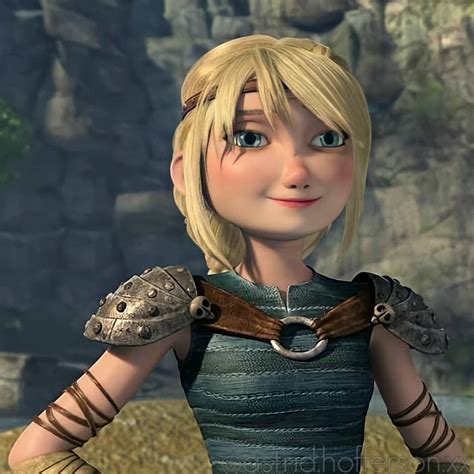 a cartoon character with blonde hair and blue eyes wearing armor ...