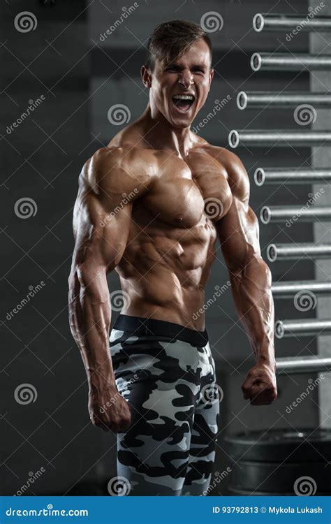 Muscular Man Showing Muscles Posing In Gym Strong Male Naked Torso