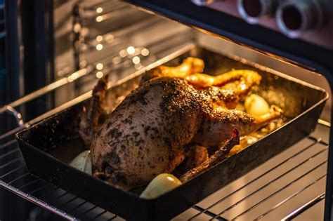 Premium Photo Close Up Of Roasted Chicken On Barbecue Grill