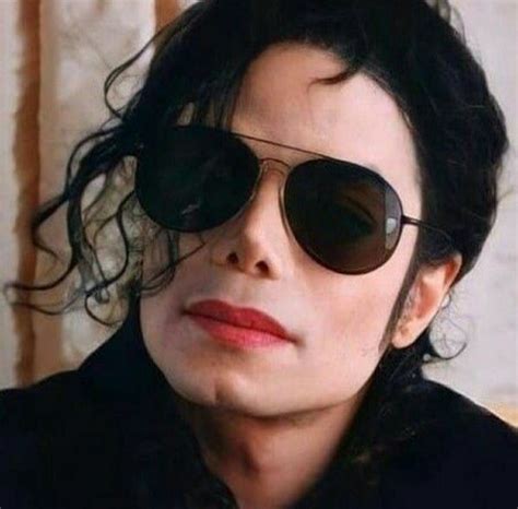 Michael Jackson Wearing Sunglasses And Looking Off To The Side