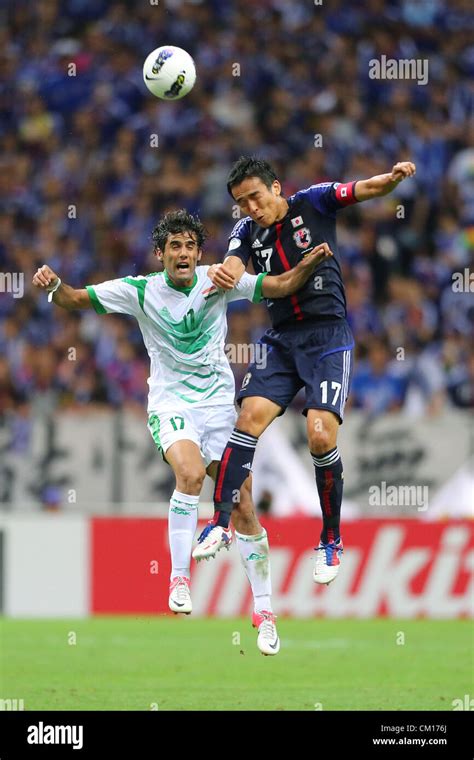 Saitama Japan L To R Alaa Abdul Zahrah Irq Makoto Hasebe Jpn