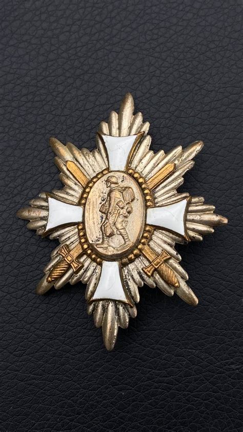 WARSTORY AUCTION - Немецкий полевой почетный знак.