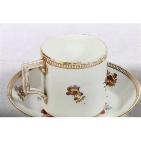 Two Meissen Cabinet Cups And Saucers Decorated With Flowers And Bird