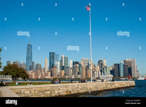 Lower Manhattan Skyline With Ellis Island National Monument Us