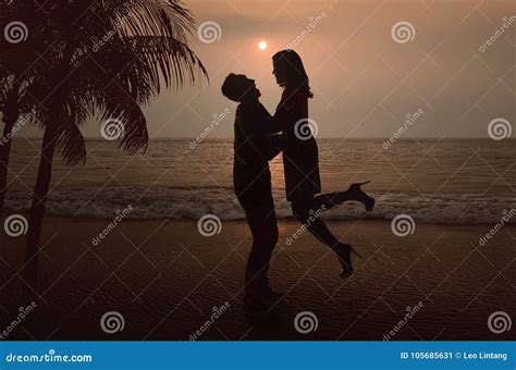 Silhouette of Asian Couple in Love on the Beach Stock Image - Image of ...