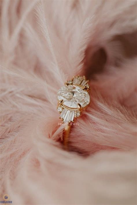 A Close Up View Of A Feather With A Ring On It S Side